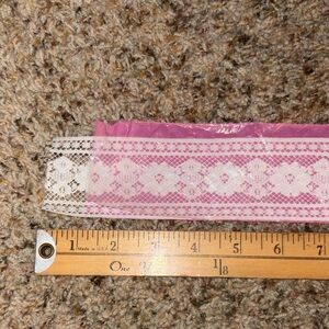 White lace trim approximately 270 inches long